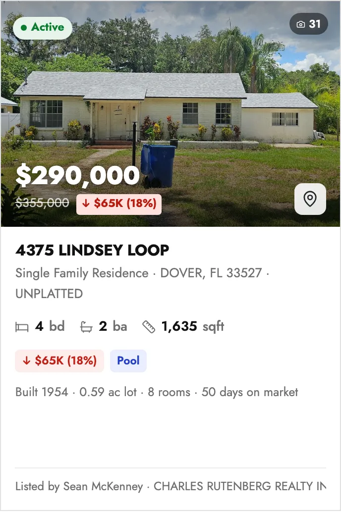 A Barbican listing card: an Active status pill and photo-count badge on the photo, the price with a struck-through original and price-drop tag, a map pin, then the address, specs, highlight chips, a details line, and the listing-agent footer.